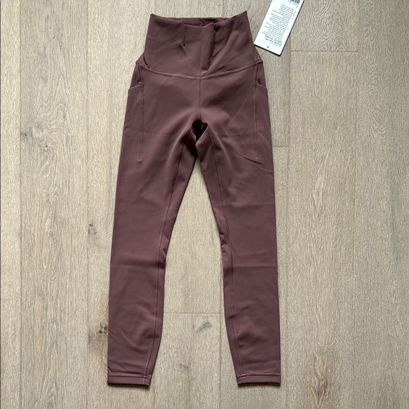 NWT wunder train high rise tight with pockets size 2 dark...